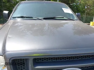 2005 Ford F-150 XL with VIN 1FTRF14W95NA43854, listed as a IAAI auction lot 42403913 with 145,151 mi miles and . Bid and sale history available at DreamBid. Image 15.