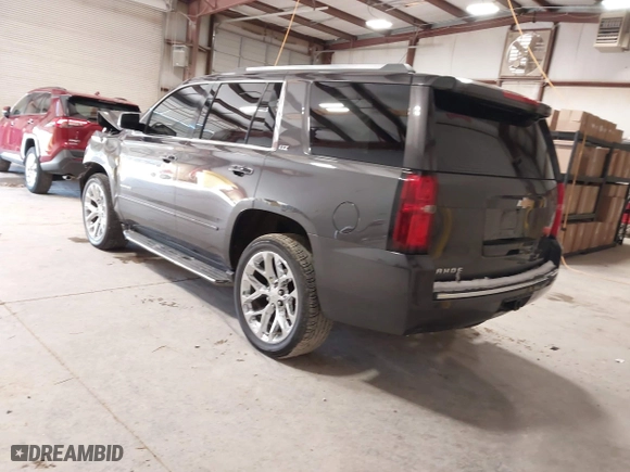 2015 Chevrolet Tahoe LTZ with VIN 1GNSCCKC2FR114442, listed as a IAAI auction lot 41629816 with 152,768 mi miles. Bid and sale history available at carsss.com. Image 3.