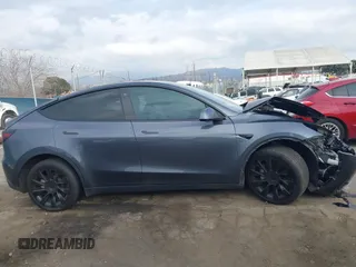 2023 Tesla Model Y Long Range with VIN 7SAYGDEE4PA028440, listed as a IAAI auction lot 41488136 with 29,229 mi miles and . Bid and sale history available at DreamBid. Image 12.