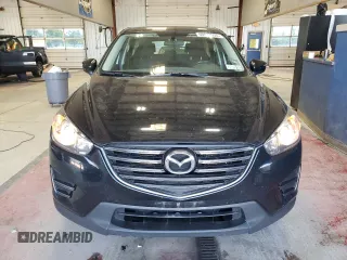 2016 Mazda CX-5 Sport with VIN JM3KE4BY1G0870166, listed as a Copart auction lot 60433035 with 93,433 mi miles and Salvage title. Bid and sale history available at DreamBid. Image 5.