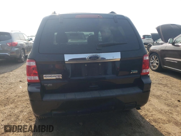 2010 Ford Escape Limited z VIN 1FMCU9EG7AKC73014, wystawiony jako Copart lot #59350805 z przebiegiem 53 032 mil mil oraz Szkoda całkowita • Salvage title. Historia ofert i sprzedaży dostępna na DreamBid. Obrazek 6.