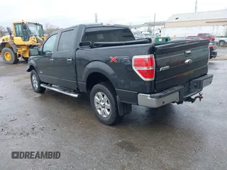 2013 Ford F-150 XL with VIN 1FTFW1ETXDFD72322, listed as a IAAI auction lot 41957807 with 312,909 mi miles. Bid and sale history available at carsss.com. Image 3.