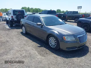 2014 Chrysler 300 with VIN 2C3CCAAG3EH237157, listed as a IAAI auction lot 41986053 with 61,372 mi miles. Bid and sale history available at carsss.com. Image 1.