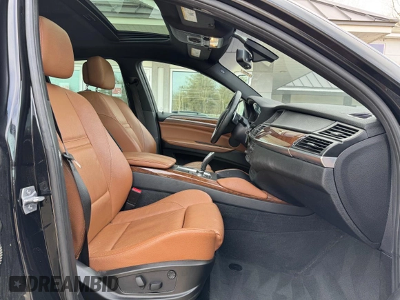 2014 BMW X6 xDrive35i z VIN 5UXFG2C57E0K41455, wystawiony jako Copart lot #58616315 z przebiegiem 162 232 mil mil oraz Czysty tytuł • Clean title. Historia ofert i sprzedaży dostępna na DreamBid. Obrazek 5.