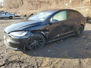 2022 Tesla Model X with VIN 7SAXCDE5XNF338681, listed as a Copart auction lot 85068334 with 0 mi miles and Salvage Title. Bid and sale history available at carsss.com. Image 1.