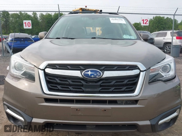 2017 Subaru Forester Touring z VIN JF2SJAWC6HH529707, wystawiony jako IAAI lot #42401138 z przebiegiem 172 868 mil mil oraz . Historia ofert i sprzedaży dostępna na DreamBid. Obrazek 12.