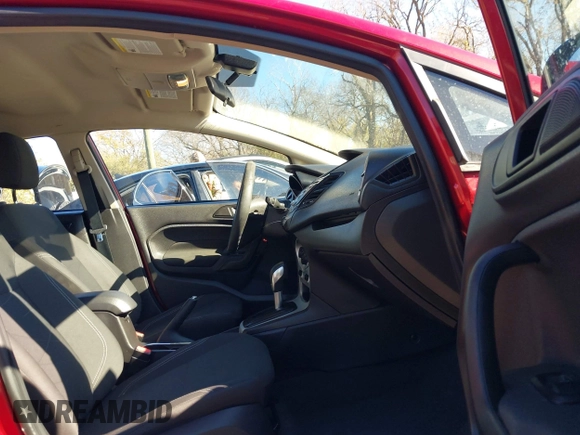 2017 Ford Fiesta SE z VIN 3FADP4BJ6HM143379, wystawiony jako IAAI lot #40863748 z przebiegiem 77 325 mil mil oraz . Historia ofert i sprzedaży dostępna na DreamBid. Obrazek 5.