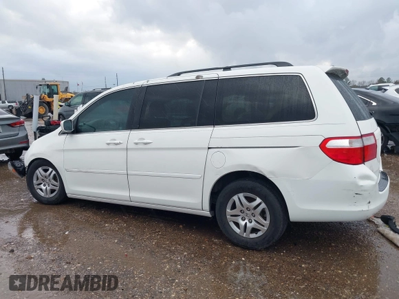 2007 Honda Odyssey EX-L z VIN 5FNRL38737B072789, wystawiony jako IAAI lot #41203148 z przebiegiem 156 828 mil mil oraz . Historia ofert i sprzedaży dostępna na DreamBid. Obrazek 13.