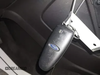 2014 Ford Escape Titanium with VIN 1FMCU9J90EUB01280, listed as a IAAI auction lot 41630208 with Not Provided miles. Bid and sale history available at carsss.com. Image 11.