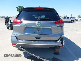 2017 Nissan Rogue SV with VIN KNMAT2MT9HP581822, listed as a IAAI auction lot 42140794 with 74,261 mi miles. Bid and sale history available at carsss.com. Image 16.