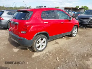 2015 Chevrolet Trax LTZ with VIN 3GNCJTSB6FL213113, listed as a IAAI auction lot 41999668 with 88,361 mi miles. Bid and sale history available at carsss.com. Image 4.