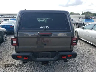 2021 Jeep Gladiator Rubicon with VIN 1C6JJTBG3ML602478, listed as a Copart auction lot 58138705 with 76,759 mi miles and Salvage title. Bid and sale history available at DreamBid. Image 6.