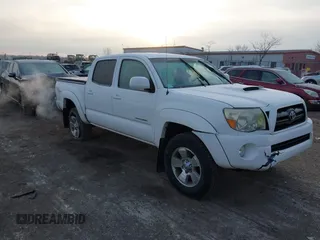 2006 Toyota Tacoma PreRunner z VIN 5TEJU62N06Z284114, wystawiony jako IAAI lot #41285658 z przebiegiem 92 160 mil mil oraz . Historia ofert i sprzedaży dostępna na DreamBid. Obrazek 1.