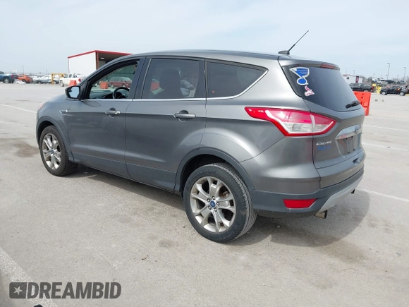 2013 Ford Escape SEL with VIN 1FMCU0HX5DUB82534, listed as a IAAI auction lot 41769014 with 182,433 mi miles. Bid and sale history available at carsss.com. Image 3.