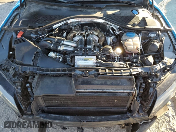 2015 Audi RS 7 Prestige z VIN WUAW2AFC8FN900199, wystawiony jako Copart lot #86767954 z przebiegiem 80 346 mil mil oraz Szkody całkowita. Historia ofert i sprzedaży dostępna na DreamBid. Obrazek 13.