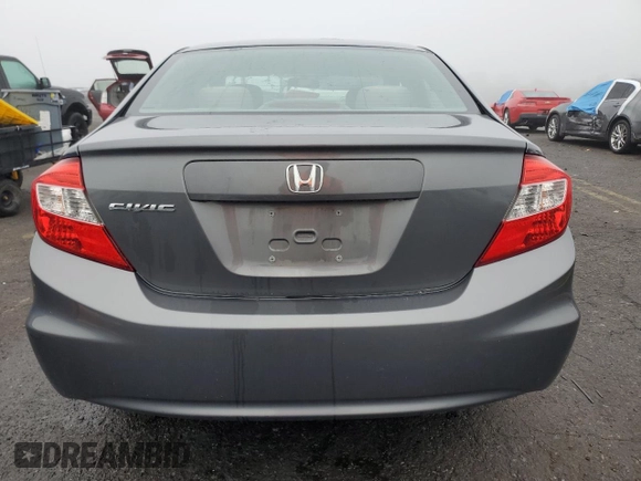 2012 Honda Civic LX z VIN 2HGFB2F50CH324974, wystawiony jako Copart lot #57442305 z przebiegiem 124 462 mil mil oraz Szkoda całkowita • Salvage title. Historia ofert i sprzedaży dostępna na DreamBid. Obrazek 6.