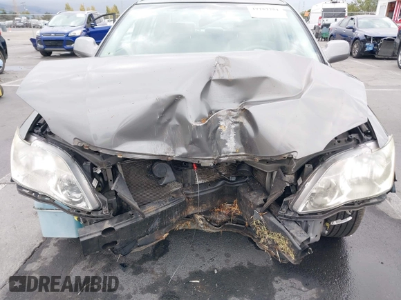 2007 Toyota Avalon XL z VIN 4T1BK36B97U185001, wystawiony jako IAAI lot #39698759 z przebiegiem 132 230 mil mil oraz . Historia ofert i sprzedaży dostępna na DreamBid. Obrazek 6.