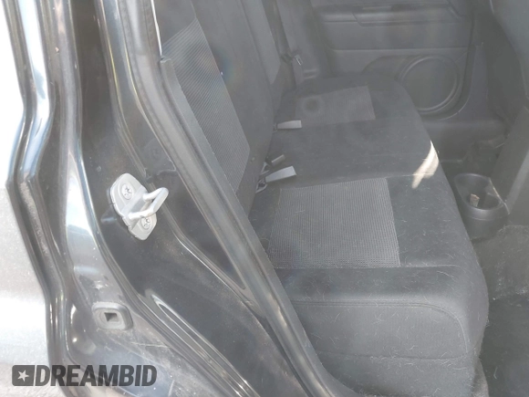 2014 Jeep Patriot Latitude with VIN 1C4NJRFB4ED720241, listed as a IAAI auction lot 40914199 with 128,218 mi miles. Bid and sale history available at carsss.com. Image 8.