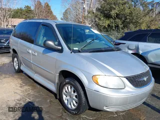 2003 Chrysler Town & Country EX with VIN 2C4GP74L83R212596, listed as a IAAI auction lot 41335410 with Not Provided miles and . Bid and sale history available at carsss.com. Image 1.