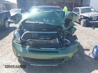 2016 MINI Countryman S z VIN WMWZC5C50GWU03242, wystawiony jako IAAI lot #41912462 z przebiegiem 68 477 mil mil oraz . Historia ofert i sprzedaży dostępna na DreamBid. Obrazek 6.