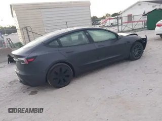 2024 Tesla Model 3 with VIN 5YJ3E1EA0RF748588, listed as a IAAI auction lot 41900733 with 2,547 mi miles. Bid and sale history available at carsss.com. Image 4.