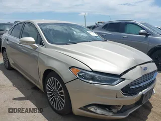 2017 Ford Fusion Hybrid Titanium with VIN 3FA6P0RU7HR388518, listed as a IAAI auction lot 42783469 with 90,081 mi miles and . Bid and sale history available at DreamBid. Image 1.