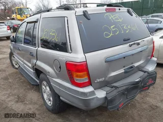 1999 Jeep Grand Cherokee Laredo with VIN 1J4GW58S9XC673310, listed as a IAAI auction lot 41927682 with 999,999 mi miles. Bid and sale history available at carsss.com. Image 3.
