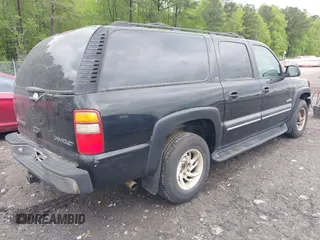 2000 Chevrolet Suburban LT with VIN 3GNFK16T0YG127485, listed as a IAAI auction lot 41957332 with 240,920 mi miles. Bid and sale history available at carsss.com. Image 4.