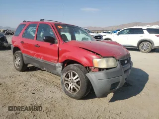 2001 Ford Escape XLS with VIN 1FMYU02161KE97828, listed as a Copart auction lot 62542154 with 186,810 mi miles and Salvage Title. Bid and sale history available at carsss.com. Image 4.