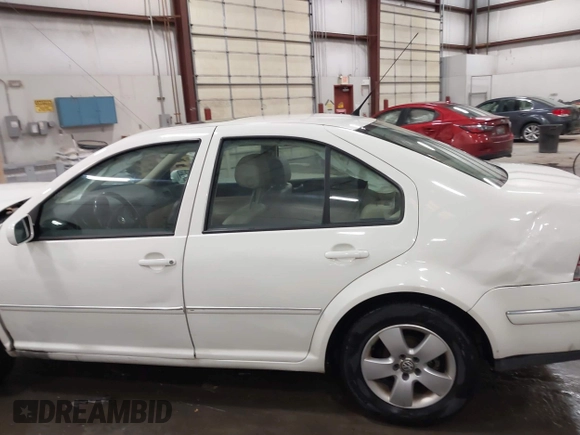 2004 Volkswagen Jetta GLS z VIN 3VWSK69MX4M078023, wystawiony jako IAAI lot #41198138 z przebiegiem 153 830 mil mil oraz . Historia ofert i sprzedaży dostępna na DreamBid. Obrazek 15.