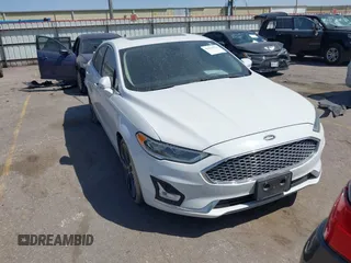 2020 Ford Fusion Titanium with VIN 3FA6P0D94LR151903, listed as a IAAI auction lot 41838221 with 93,602 mi miles and . Bid and sale history available at DreamBid. Image 1.