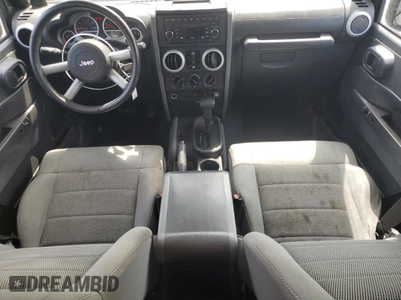 2008 Jeep Wrangler Unlimited Sahara with VIN 1J4GB59108L653823, listed as a Copart auction lot 56324635 with 170,831 mi miles and Clean title. Bid and sale history available at DreamBid. Image 8.
