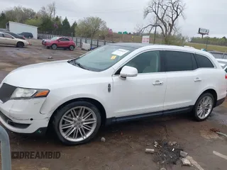 2014 Lincoln MKT EcoBoost with VIN 2LMHJ5AT0EBL50661, listed as a IAAI auction lot 41898237 with 118,770 mi miles and . Bid and sale history available at DreamBid. Image 14.