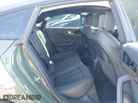 2023 Audi S5 Sportback Premium Plus z VIN WAUB4CF56PA007375, wystawiony jako IAAI lot #41630832 z przebiegiem 23 668 mil mil oraz . Historia ofert i sprzedaży dostępna na DreamBid. Obrazek 8.
