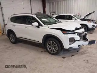 2019 Hyundai Santa Fe Limited with VIN 5NMS5CAD2KH021934, listed as a IAAI auction lot 40726332 with 52,994 mi miles. Bid and sale history available at carsss.com. Image 1.