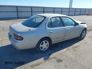 1997 Nissan Altima XE with VIN 1N4BU31D4VC221788, listed as a IAAI auction lot 41356945 with 136,931 mi miles. Bid and sale history available at carsss.com. Image 4.