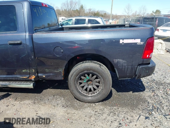 2015 Ram 1500 Tradesman z VIN 1C6RR7FT2FS615788, wystawiony jako IAAI lot #41804216 z przebiegiem 125 020 mil mil oraz . Historia ofert i sprzedaży dostępna na DreamBid. Obrazek 6.