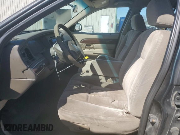 2003 Mercury Grand Marquis GS Convenience with VIN 2MEFM74W03X638534, listed as a Copart auction lot 49371535 with 335,360 mi miles and Salvage Title. Bid and sale history available at DreamBid. Image 7.