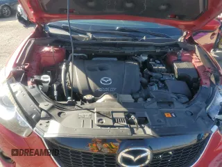 2014 Mazda CX-5 Grand Touring with VIN JM3KE4DY9E0419111, listed as a Copart auction lot 52250315 with 130,003 mi miles and Salvage Title. Bid and sale history available at DreamBid. Image 13.