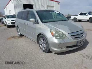2005 Honda Odyssey TOURING with VIN 5FNRL38895B060605, listed as a IAAI auction lot 41809330 with 228,487 mi miles. Bid and sale history available at carsss.com. Image 1.