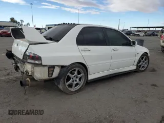 2005 Mitsubishi Lancer Evolution VIII with VIN JA3AH86D45U028033, listed as a Copart auction lot 74323774 with 204,046 mi miles and Salvage Title. Bid and sale history available at carsss.com. Image 3.