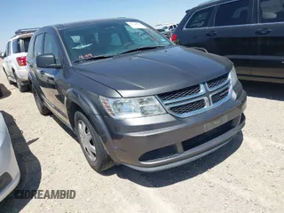 2015 Dodge Journey SE z VIN 3C4PDCAB8FT632311, wystawiony jako IAAI lot #41940557 z przebiegiem 73 225 mil mil oraz . Historia ofert i sprzedaży dostępna na DreamBid. Obrazek 1.