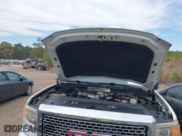 2016 GMC Sierra 2500HD Denali z VIN 1GT12UE82GF130096, wystawiony jako IAAI lot #41869448 z przebiegiem 129 659 mil mil oraz . Historia ofert i sprzedaży dostępna na DreamBid. Obrazek 10.