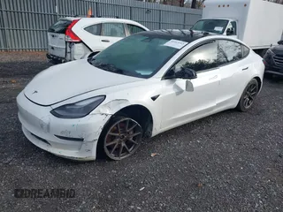 2021 Tesla Model 3 Long Range with VIN 5YJ3E1EB8MF974007, listed as a IAAI auction lot 41915513 with 107,354 mi miles and . Bid and sale history available at carsss.com. Image 19.