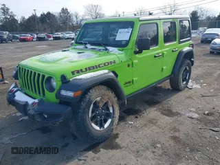 2021 Jeep Wrangler Unlimited Rubicon with VIN 1C4JJXFM1MW797737, listed as a IAAI auction lot 41371288 with 48,129 mi miles. Bid and sale history available at carsss.com. Image 2.