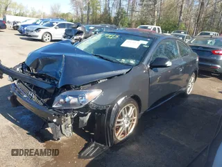 2007 Scion tC Spec with VIN JTKDE167670200865, listed as a IAAI auction lot 41971175 with 182,058 mi miles. Bid and sale history available at carsss.com. Image 2.