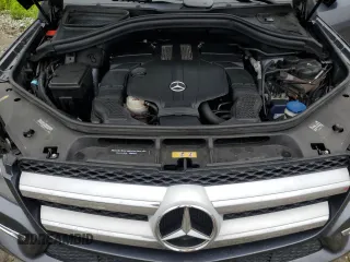 2015 Mercedes-Benz GL 450 z VIN 4JGDF6EE7FA455093, wystawiony jako Copart lot #57187135 z przebiegiem 105 573 mil mil oraz Tytuł czysty. Historia ofert i sprzedaży dostępna na DreamBid. Obrazek 12.