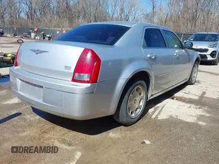 2006 Chrysler 300 Touring with VIN 2C3KA53G96H109576, listed as a IAAI auction lot 41837473 with 149,438 mi miles. Bid and sale history available at carsss.com. Image 4.