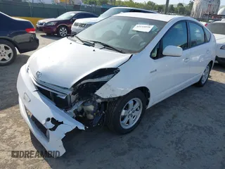 2009 Toyota Prius with VIN JTDKB20U093484619, listed as a IAAI auction lot 42110058 with 223,010 mi miles. Bid and sale history available at carsss.com. Image 2.