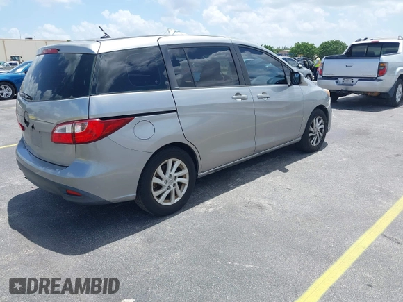 2012 Mazda 5 Sport with VIN JM1CW2BL8C0129591, listed as a IAAI auction lot 42513037 with 177,206 mi miles and . Bid and sale history available at DreamBid. Image 4.